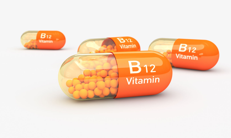 4 cápsulas de vitamina b12 em laranja